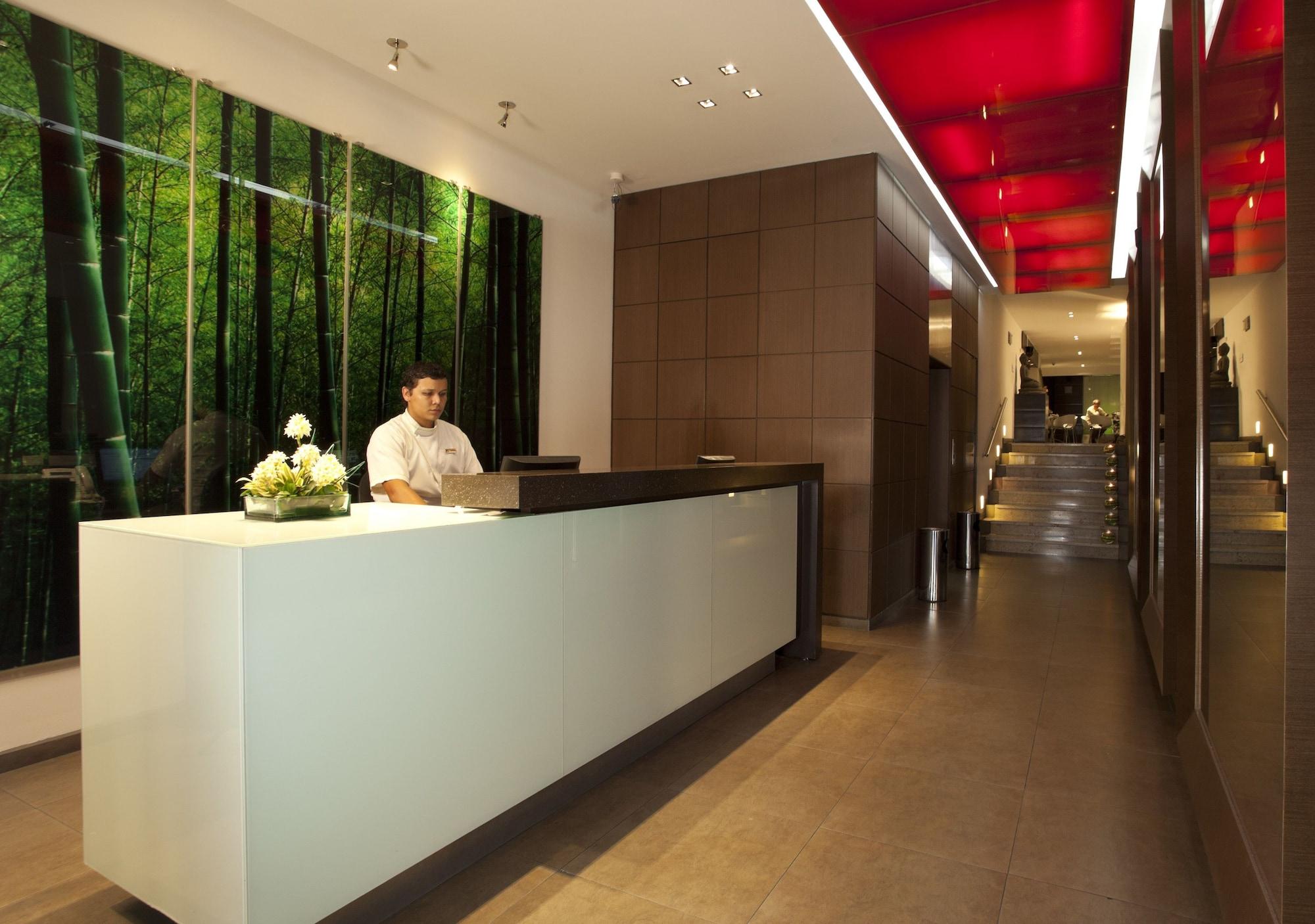 San Simon Hotel Pereira By Soratama エクステリア 写真 The reception area of the hotel