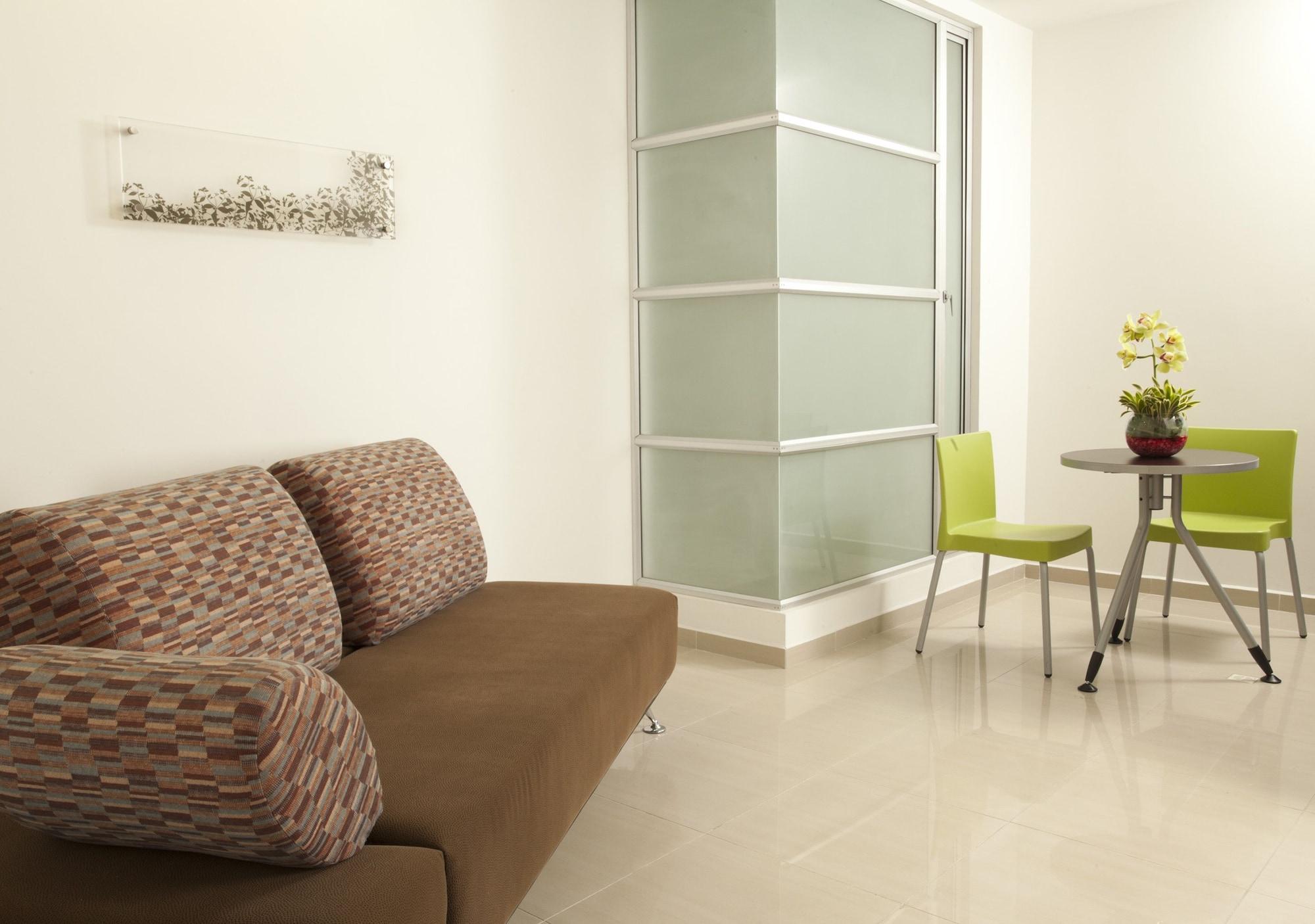 San Simon Hotel Pereira By Soratama エクステリア 写真 A room with a vinyl floor