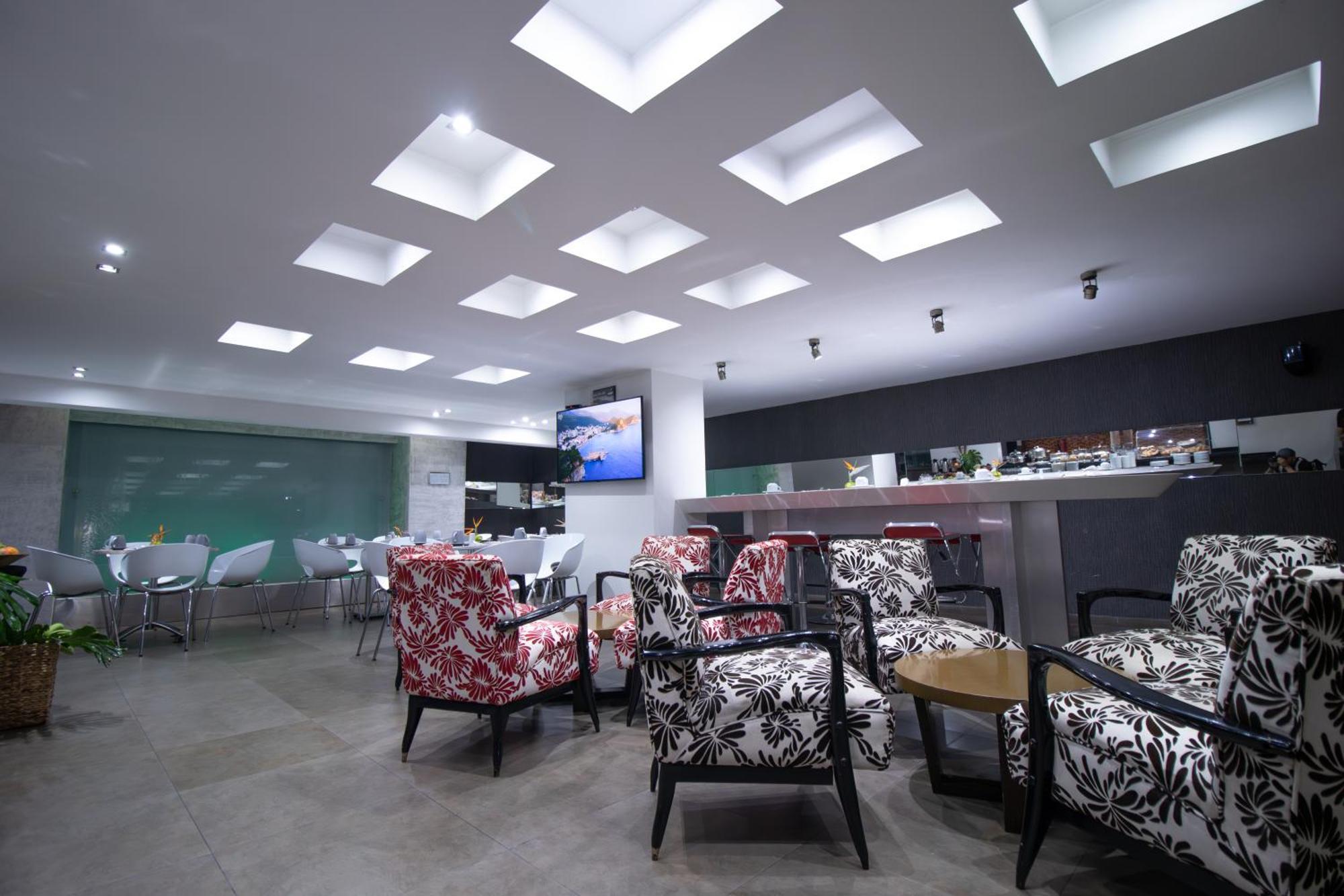 San Simon Hotel Pereira By Soratama エクステリア 写真 The lounge at the airport.