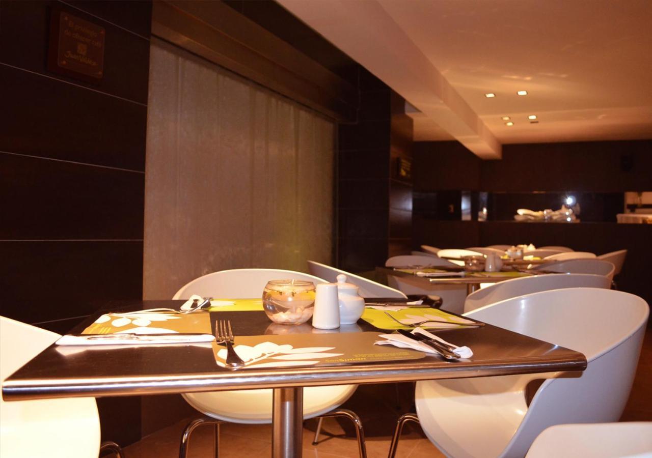 San Simon Hotel Pereira By Soratama エクステリア 写真 The interior of the restaurant