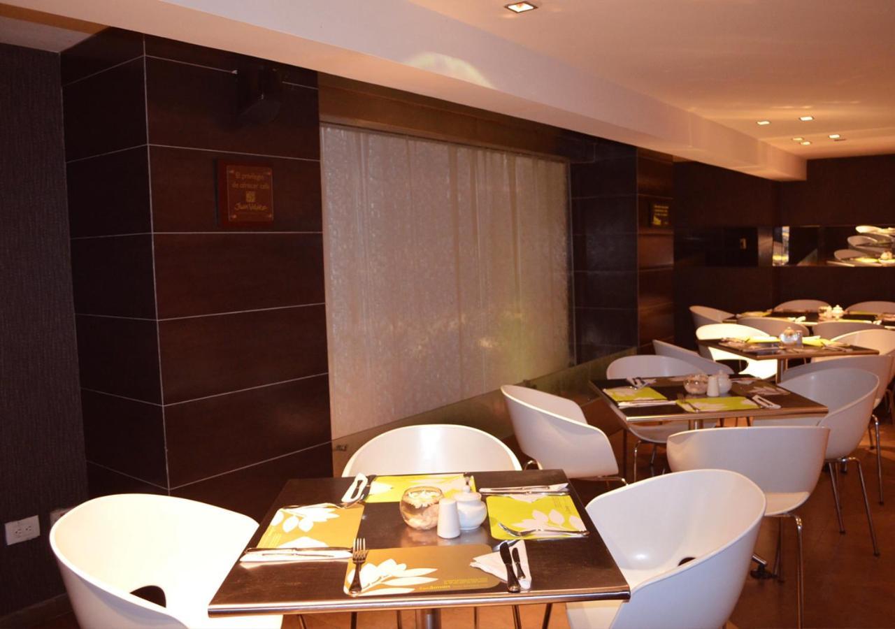 San Simon Hotel Pereira By Soratama エクステリア 写真 The interior of the restaurant